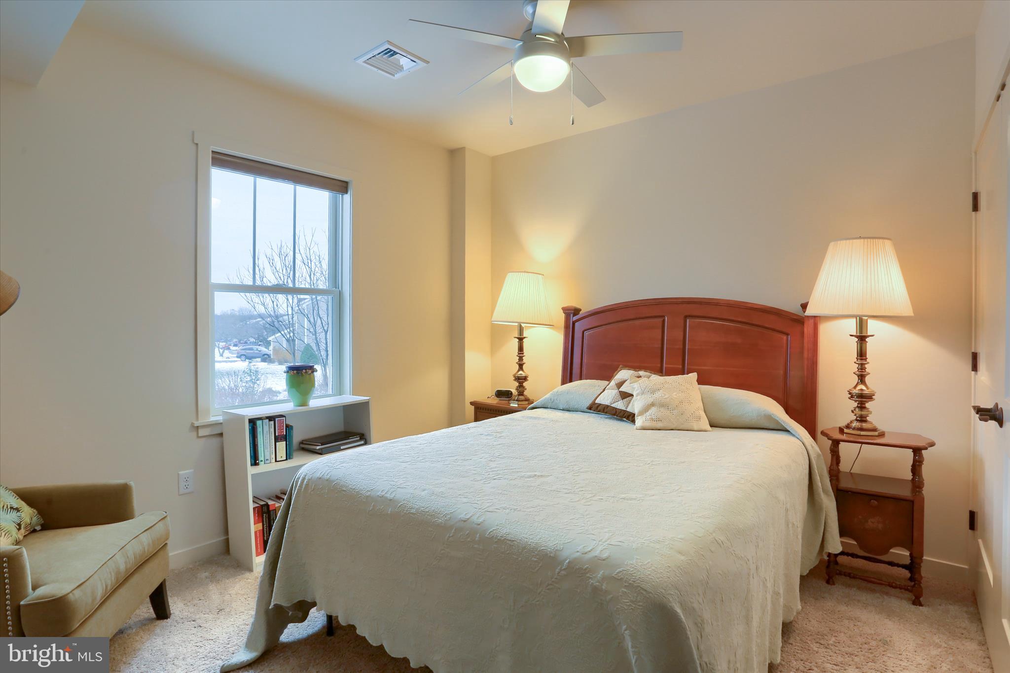 6238 Overview Lane Harrisburg, PA 17111 - Photo 26 of 34 a bedroom with a bed and a lamp