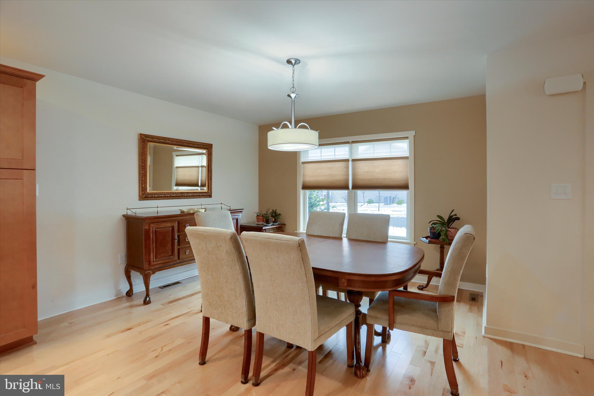 6238 Overview Lane Harrisburg, PA 17111 - Photo 7 of 34 a dining room with furniture a chandelier and wooden floor