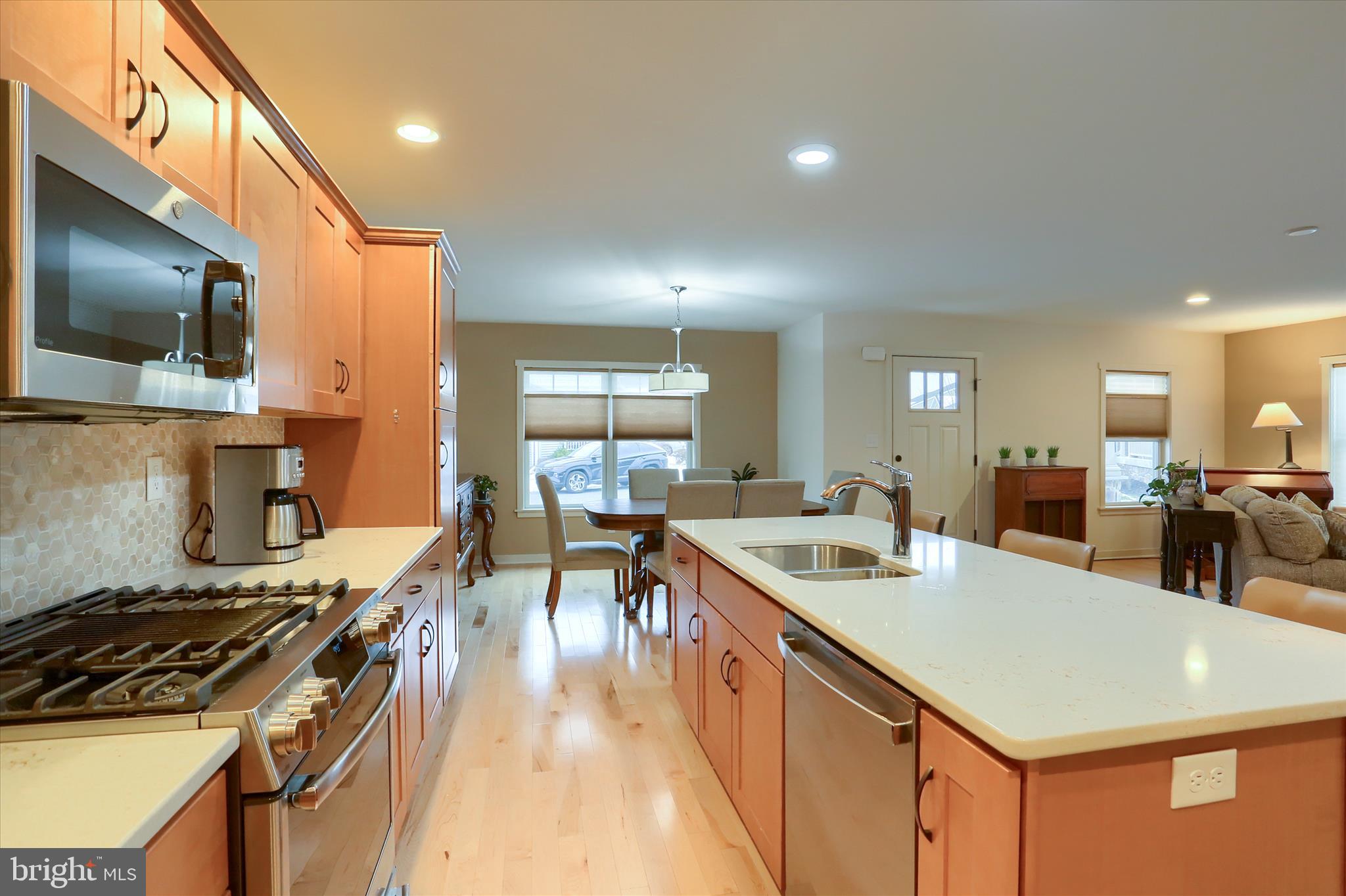 6238 Overview Lane Harrisburg, PA 17111 - Photo 10 of 34 a kitchen with a stove and a flat screen tv