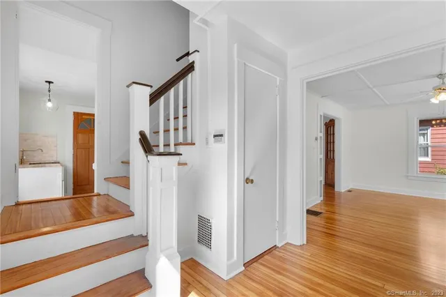 a view of a living room and hardwood floor