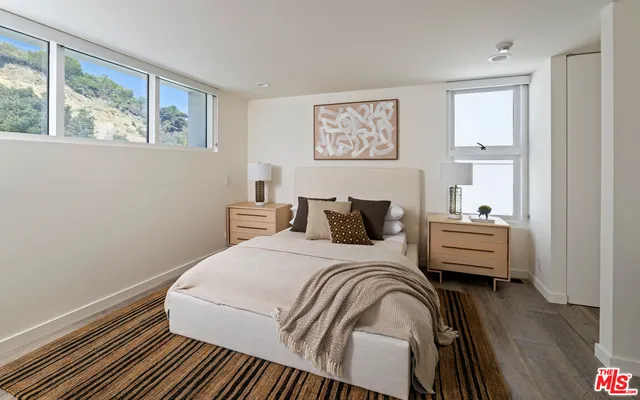 a bathroom with a granite countertop sink mirror and double