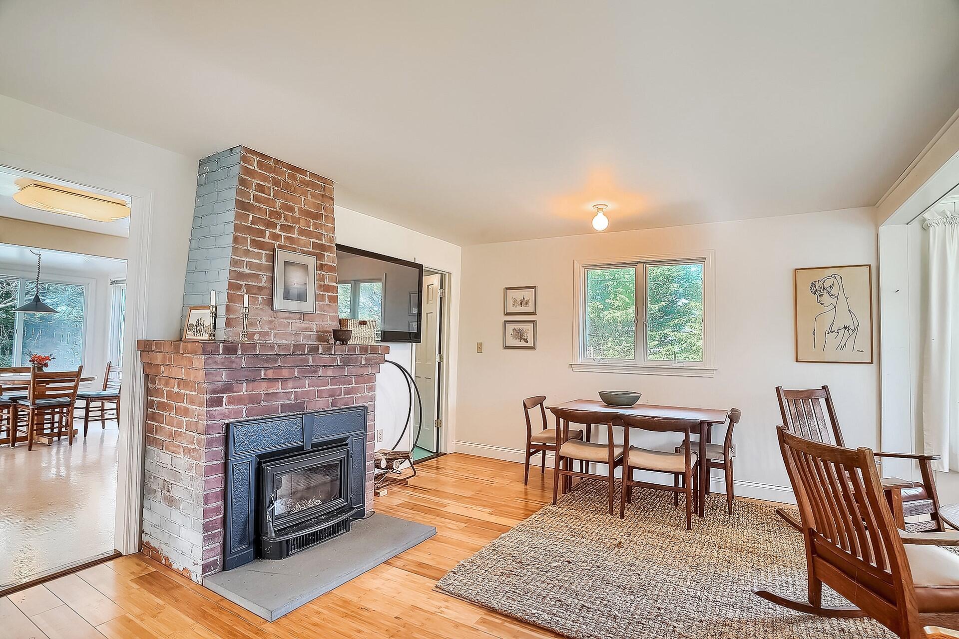 8 Standish Road Orleans, MA 02653 - Photo 6 of 28 a living room with furniture and a fireplace
