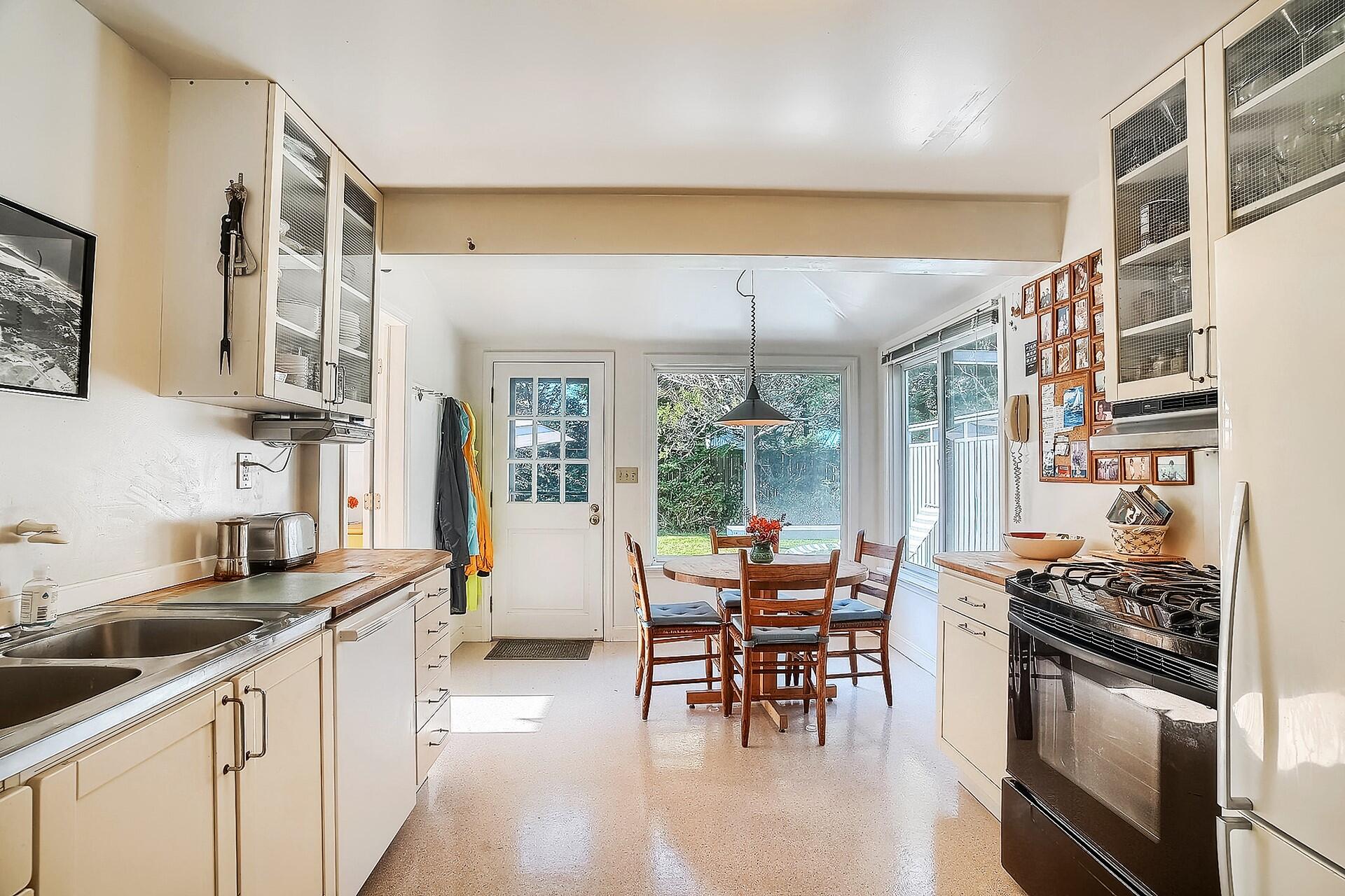 8 Standish Road Orleans, MA 02653 - Photo 8 of 28 a kitchen with stainless steel appliances granite countertop a stove and a sink