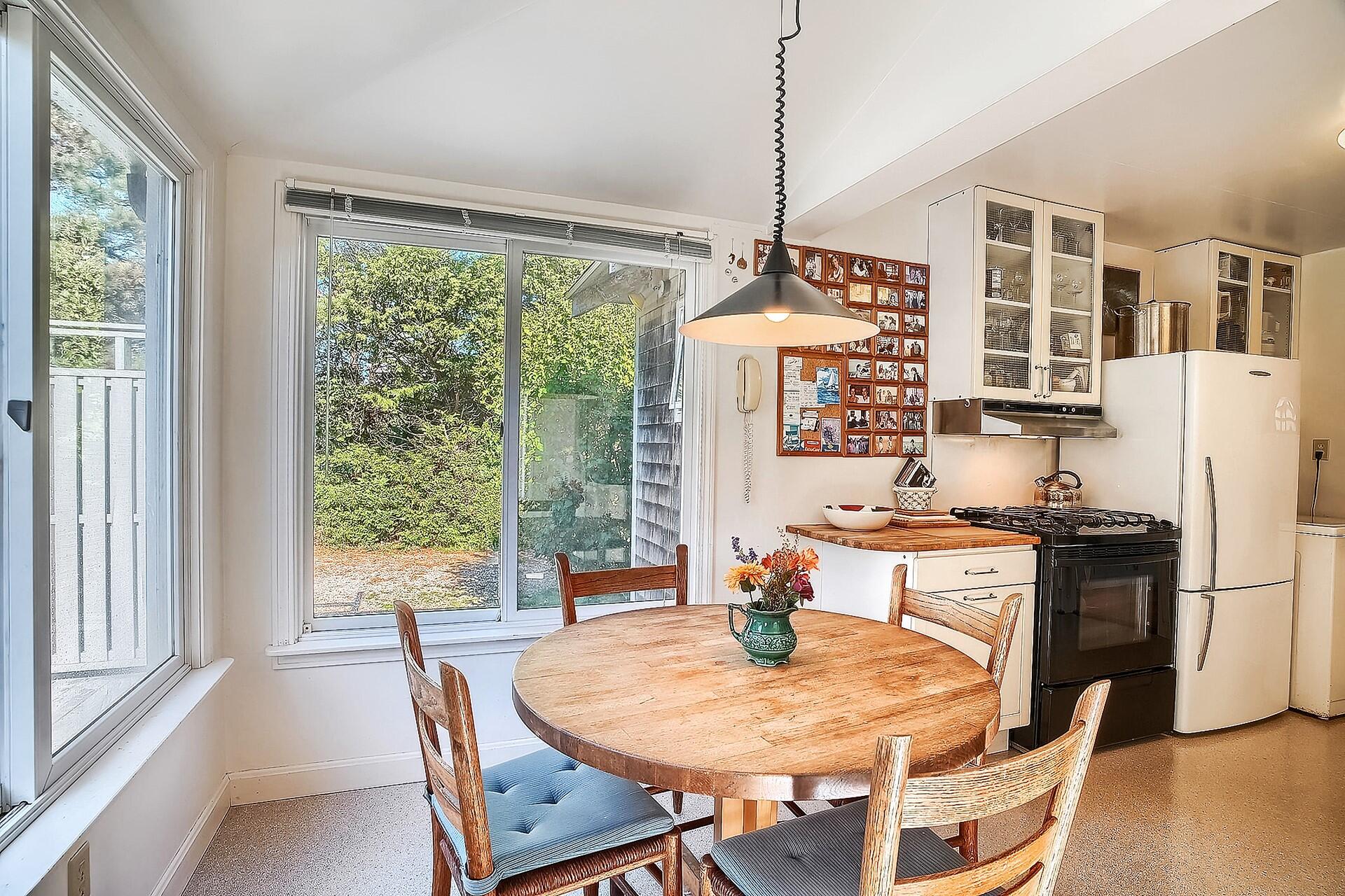 8 Standish Road Orleans, MA 02653 - Photo 10 of 28 a view of a dining room with furniture window and wooden floor