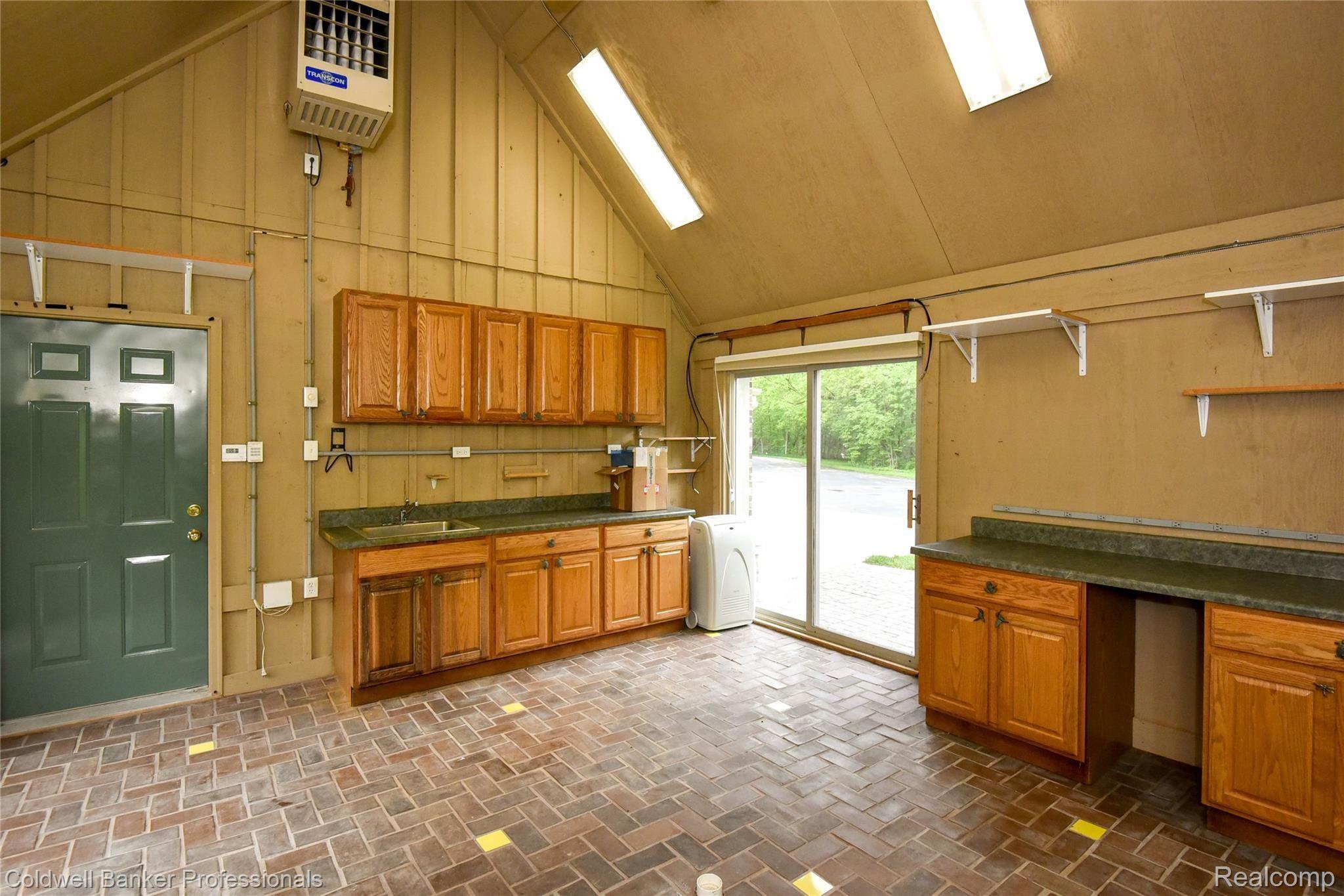 9275 Fox Hollow Road Clarkston, MI 48348 - Photo 59 of 68 Potting Room Attached to Garage (heated and AC)