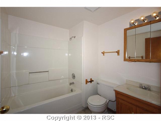 6630 Turkey Tracks Road Colorado Springs, CO 80922 - Photo 21 of 25 Bathroom in basement - like new!