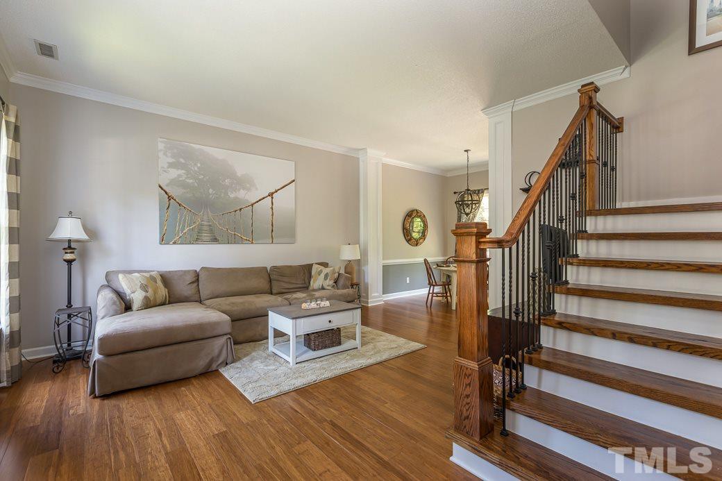 5420 Bakers Mill Road Durham, NC 27707 - Photo 2 of 20 Entry foyer into living room. Rich hardwood floors.