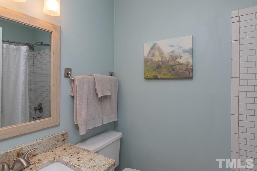 5420 Bakers Mill Road Durham, NC 27707 - Photo 16 of 20 Granite CT and Tile tub/shower surround.