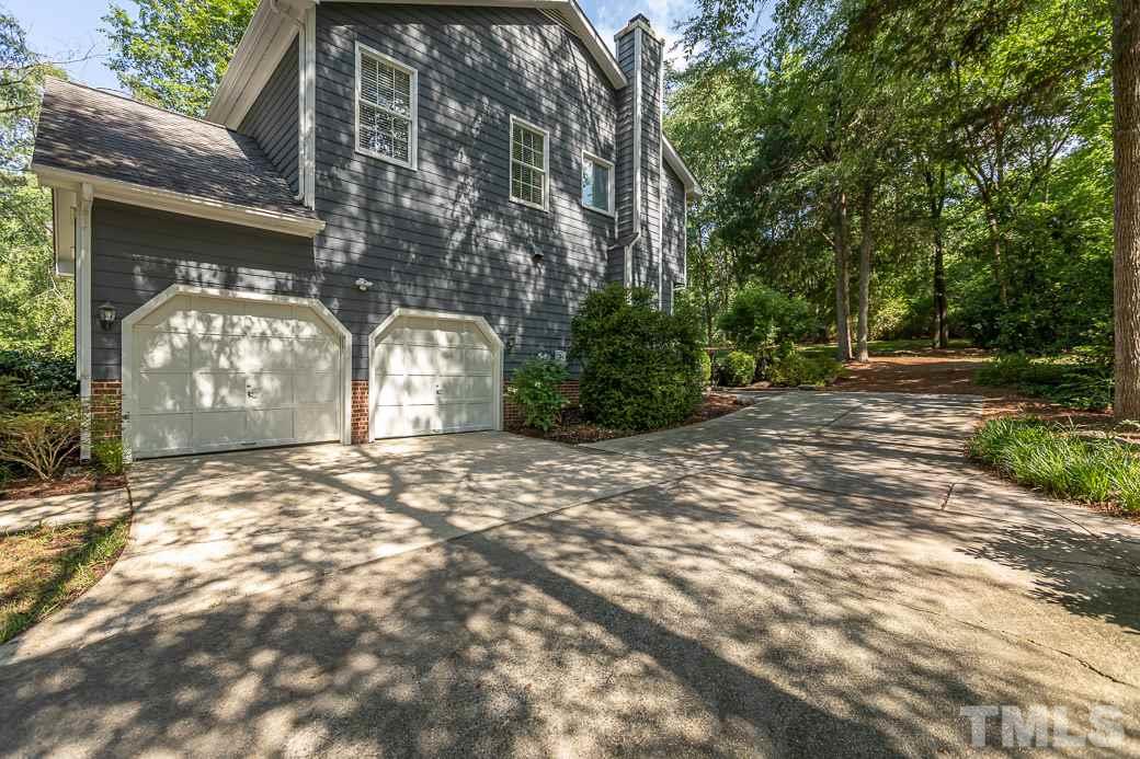 5420 Bakers Mill Road Durham, NC 27707 - Photo 20 of 20 Garage side entry with additional parking pad.