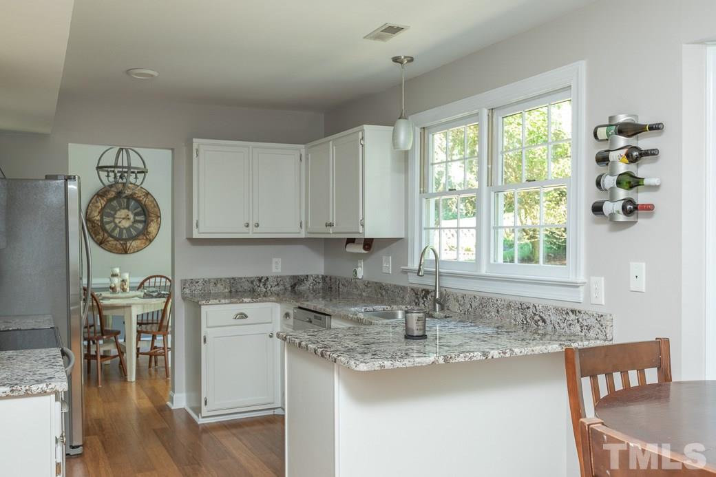 5420 Bakers Mill Road Durham, NC 27707 - Photo 5 of 20 Designer Granite CTs, Over sink windows present a picture view.