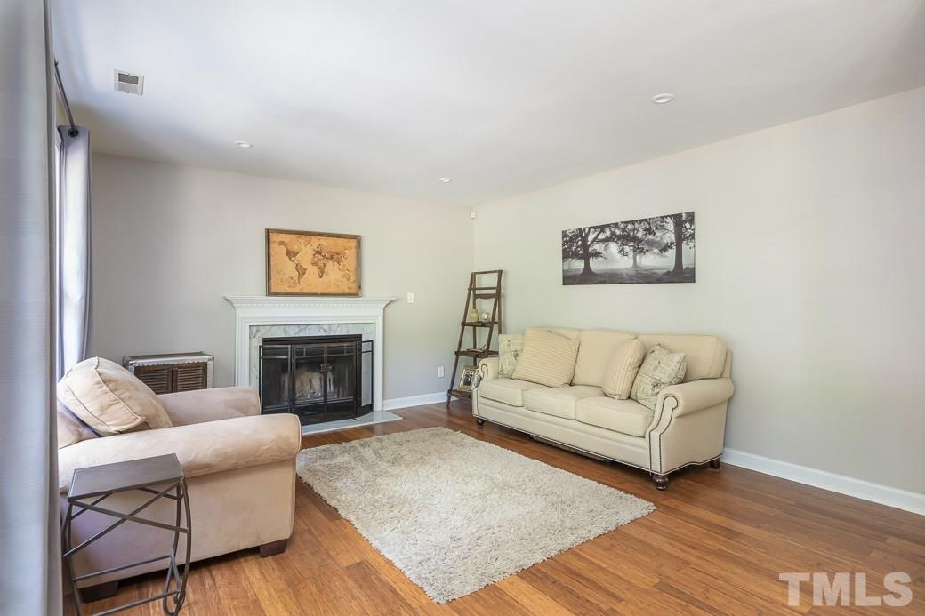 5420 Bakers Mill Road Durham, NC 27707 - Photo 9 of 20 Cozy wood burning fireplace.