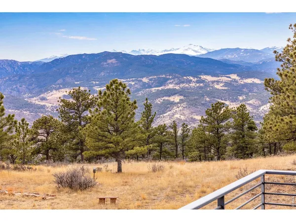 a view of a backyard with a mountain