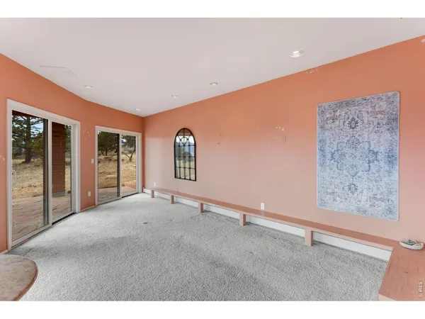 a bathroom with a sink a large mirror and a bathtub