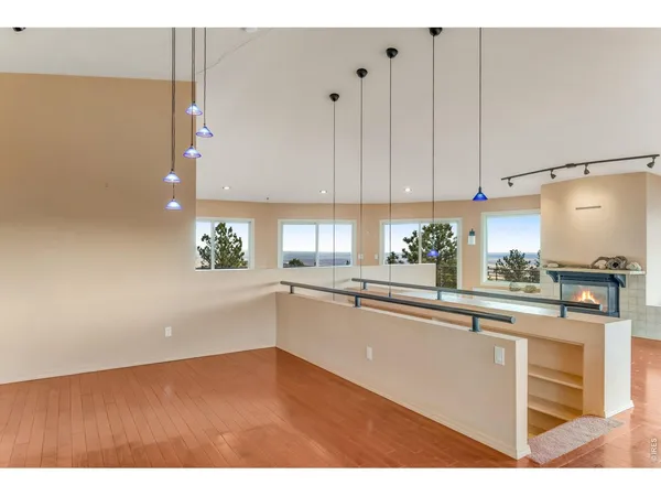 a kitchen with cabinets and window