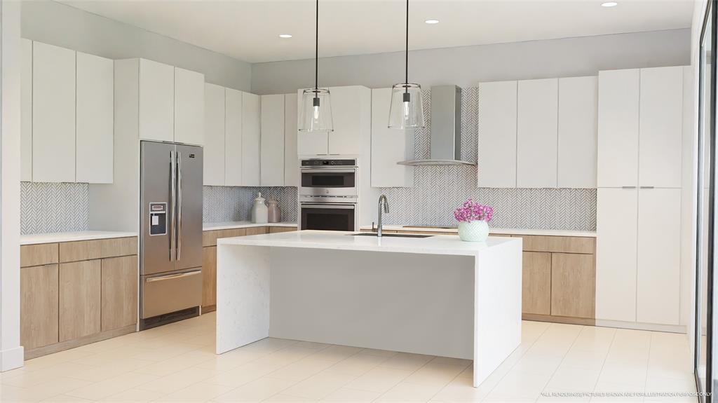1438 Southwest 23rd Street Fort Lauderdale, FL 33315 - Photo 2 of 12 a kitchen with cabinets and stainless steel appliances