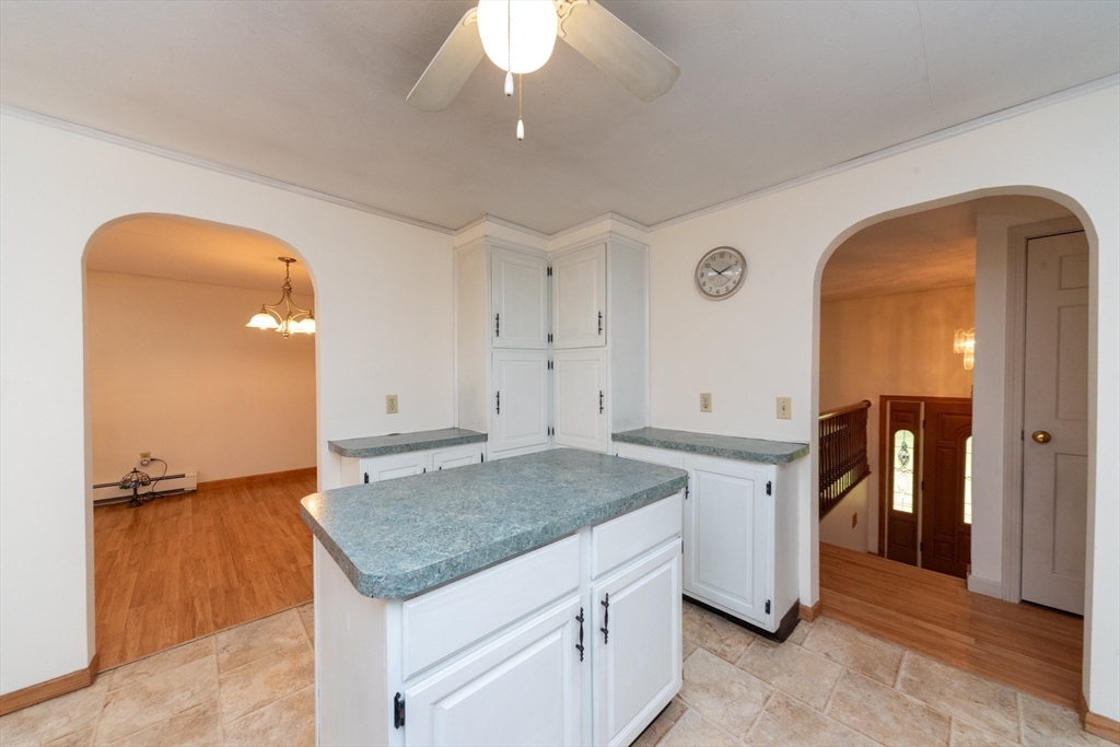 205 Beaman Road Sterling, MA 01564 - Photo 14 of 41 a view of a kitchen with a sink and a refrigerator