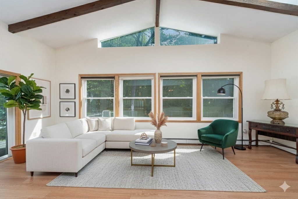 205 Beaman Road Sterling, MA 01564 - Photo 5 of 41 a living room with furniture and a large window