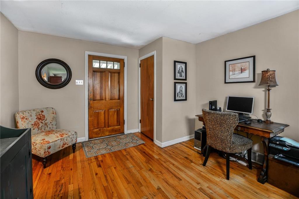 131 Inwood Road Pittsburgh, PA 15237 - Photo 3 of 25 a workspace with furniture and wooden floor