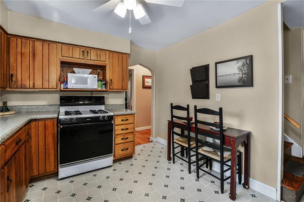 131 Inwood Road Pittsburgh, PA 15237 - Photo 8 of 25 a kitchen with stainless steel appliances a stove a sink and a refrigerator