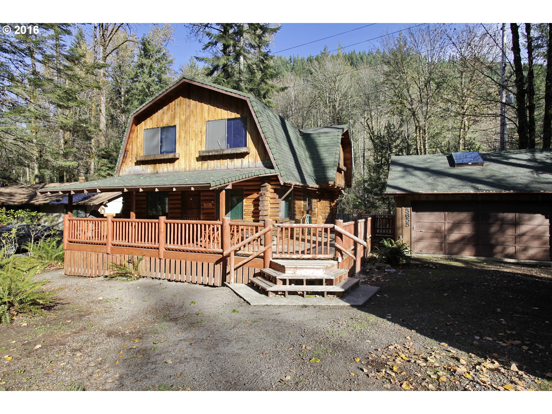 65655 East Timberline Drive Rhododendron, OR 97049 - Photo 1 of 24 a view of a house with backyard and sitting area