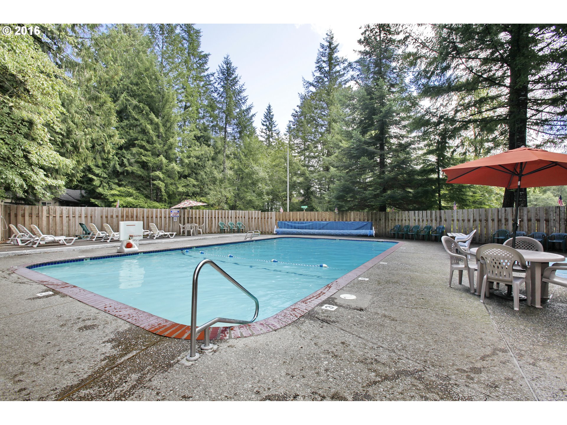 65655 East Timberline Drive Rhododendron, OR 97049 - Photo 17 of 24 a view of a swimming pool with a patio