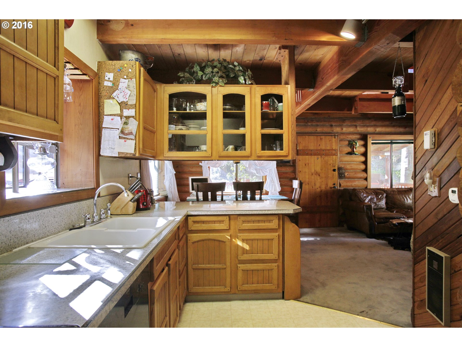 65655 East Timberline Drive Rhododendron, OR 97049 - Photo 7 of 24 a kitchen with a stove and a sink