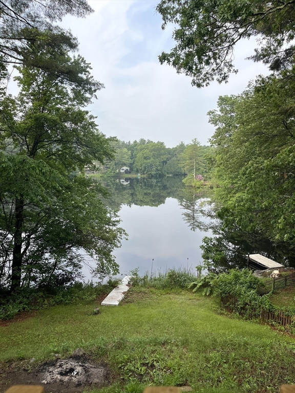 56 Shore Drive Upton, MA 01568 - Photo 18 of 23 a view of a lake with a garden