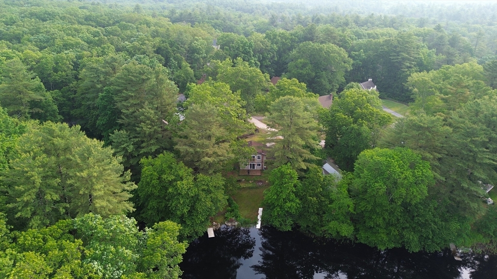 56 Shore Drive Upton, MA 01568 - Photo 20 of 23 a view of a forest with a street