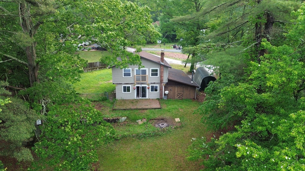 56 Shore Drive Upton, MA 01568 - Photo 2 of 23 front view of a house with a yard