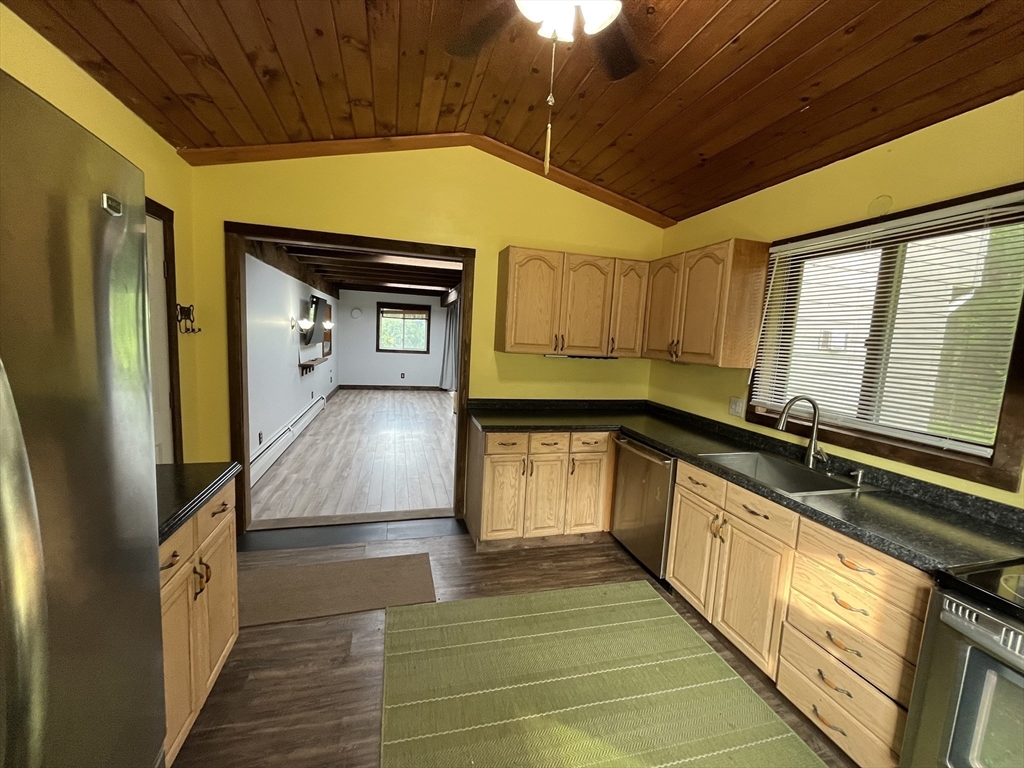 56 Shore Drive Upton, MA 01568 - Photo 8 of 23 a kitchen with stainless steel appliances a sink and a refrigerator