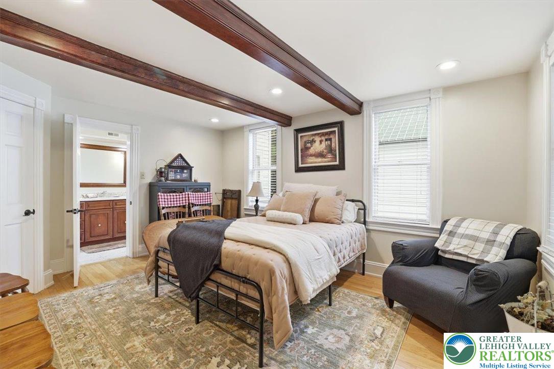 3585 Fairyland Road Lehighton, PA 18235 - Photo 36 of 57 a bedroom with a bed and a couch