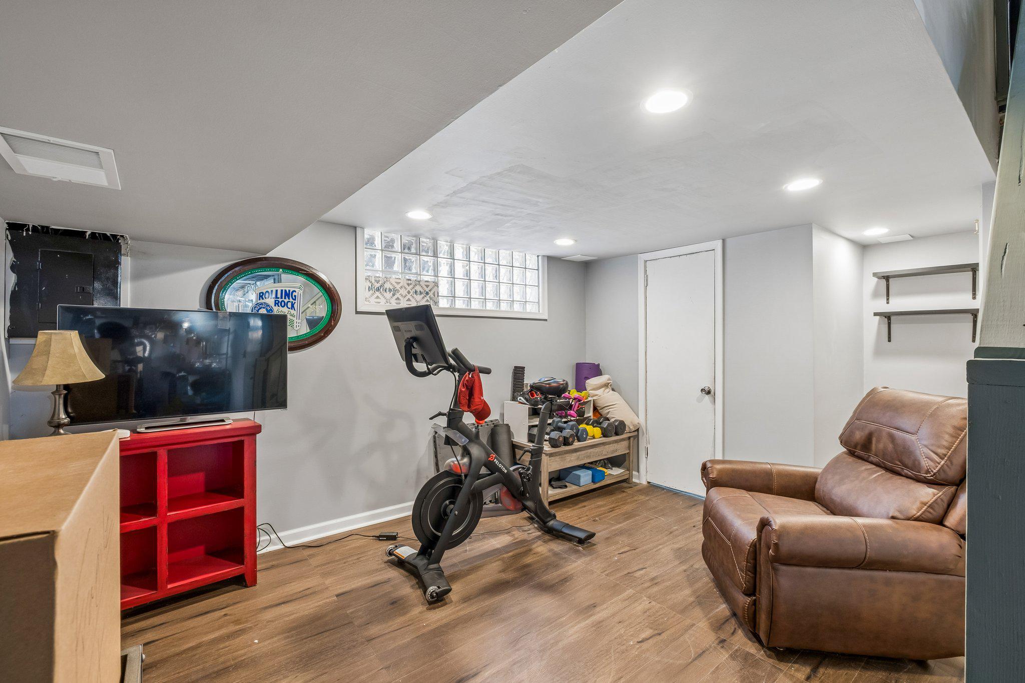 725 Hill Road Philadelphia, PA 19128 - Photo 26 of 43 a living room with furniture a air conditioner vent and a window
