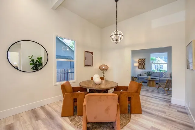 a kitchen with stainless steel appliances granite countertop wooden cabinets a stove top oven a sink and dishwasher