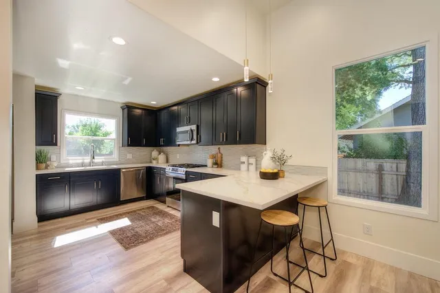 a bedroom with a bed and a mirror