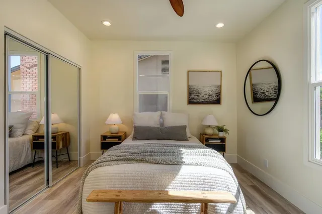 a view of a hallway with seating area