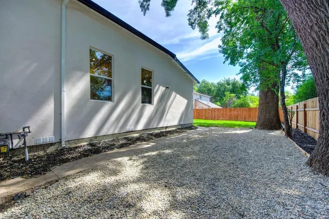 a car parked in front of a house