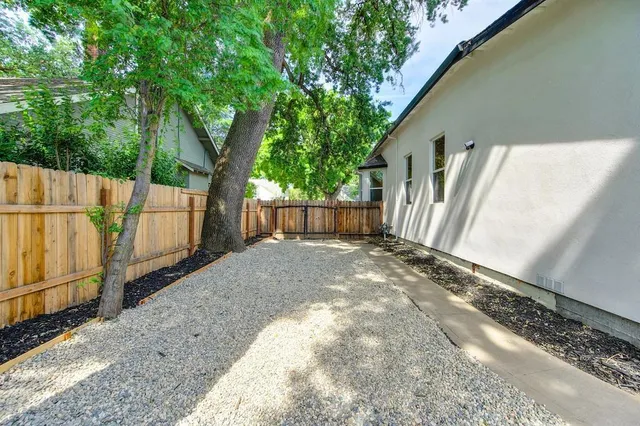 a view of balcony and yard