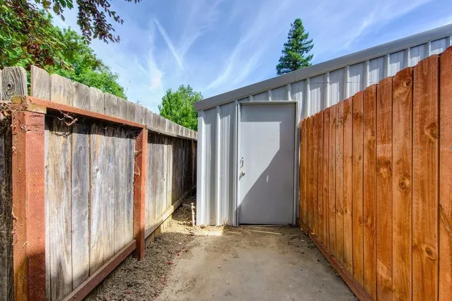 a room with furniture and flat screen tv