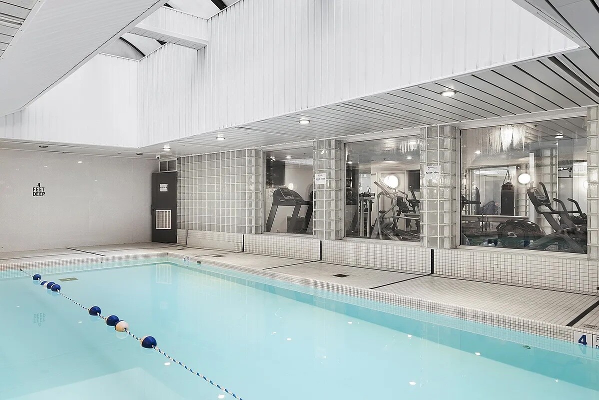 50 Lexington Avenue, Unit 22C Manhattan, NY 10010 - Photo 9 of 14 a bathroom with a tub and shower