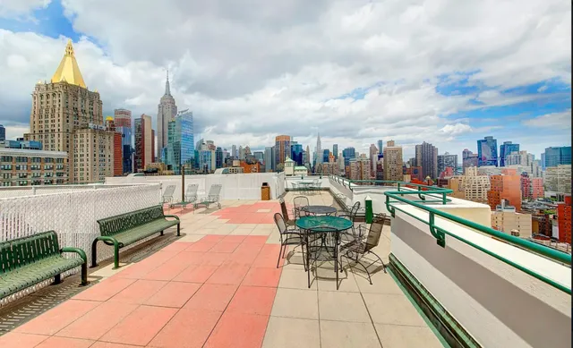 a view of roof with sitting area