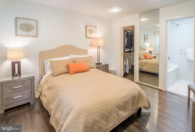 a bedroom with a bed and a view