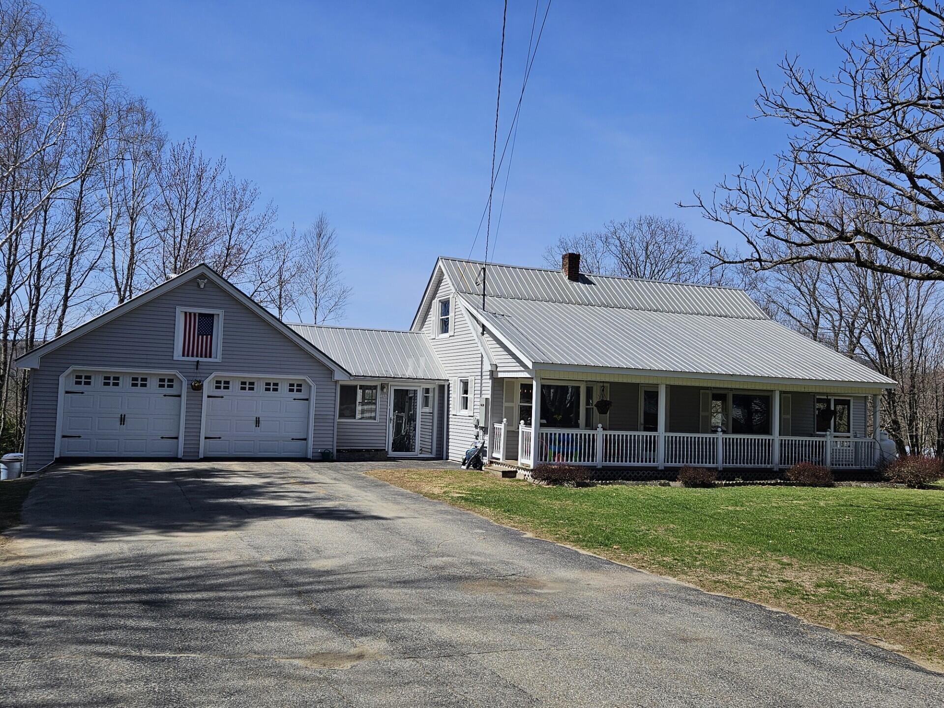 412 Weld Road Wilton, ME 04294 - Photo 1 of 83 front