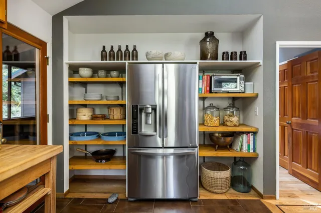 a view of balcony with outdoor seating and wooden floor