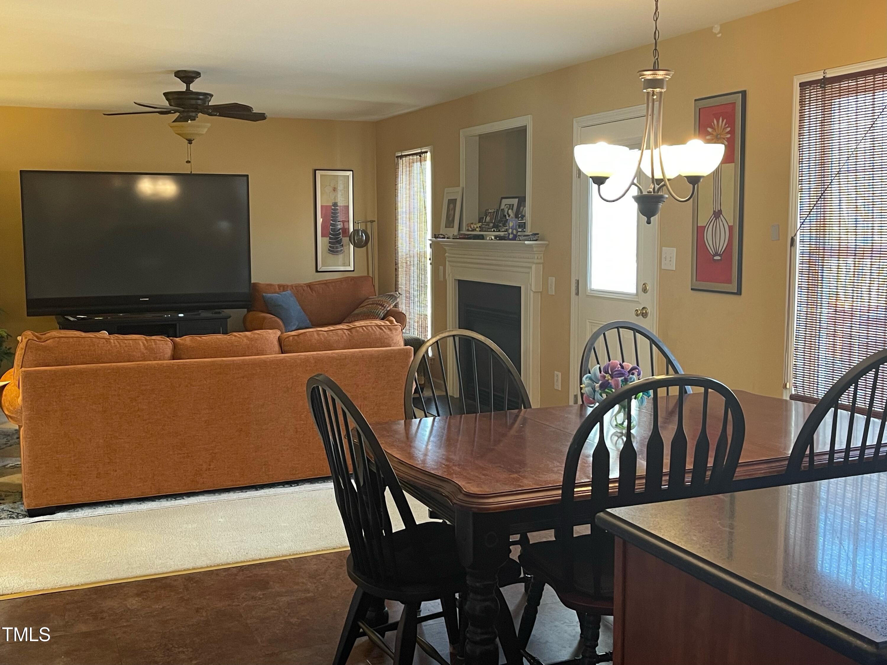 112 Grassy Valley Road Holly Springs, NC 27540 - Photo 15 of 39 a dining room with furniture and window