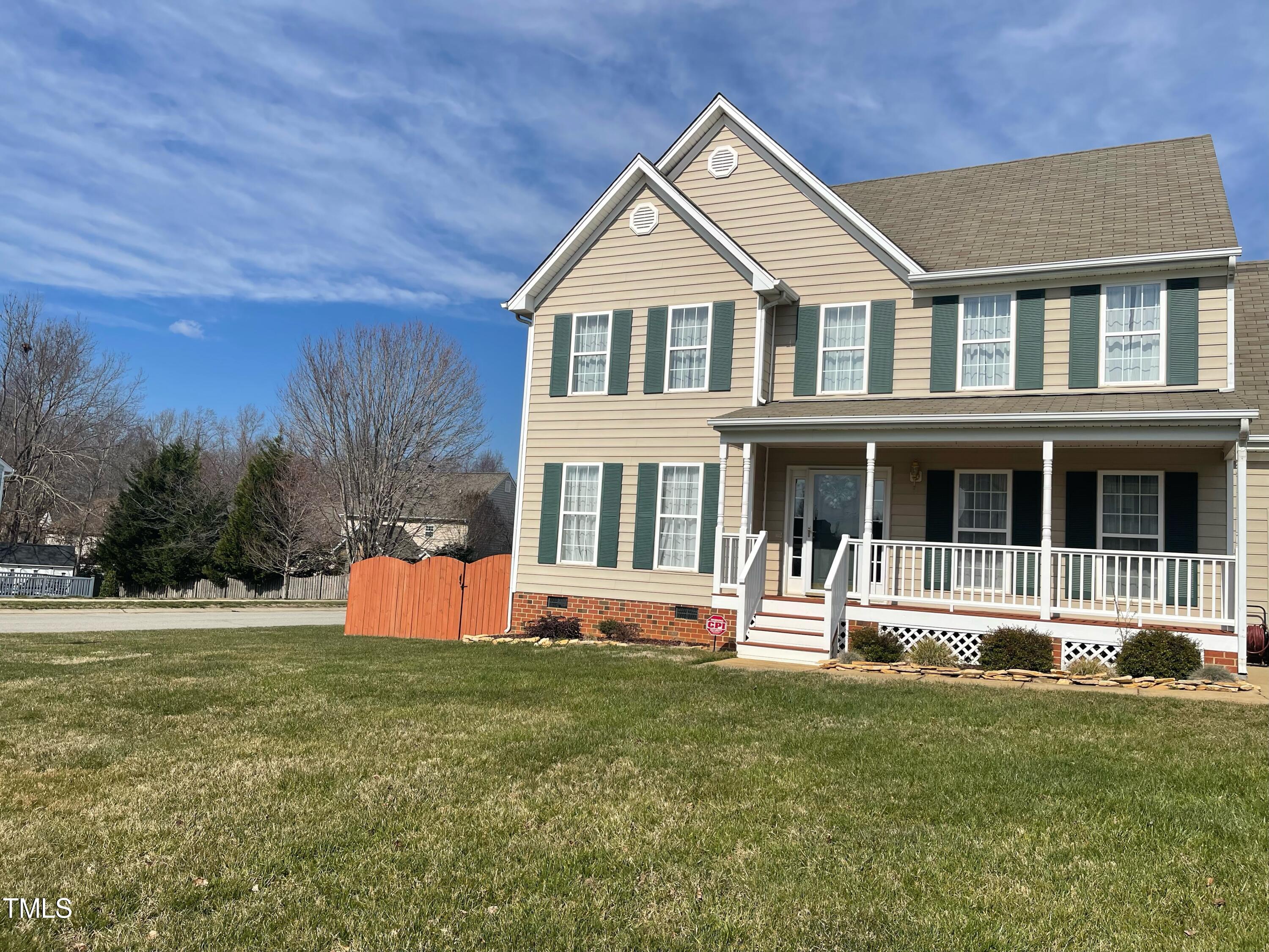 112 Grassy Valley Road Holly Springs, NC 27540 - Photo 2 of 39 a front view of a house with a yard