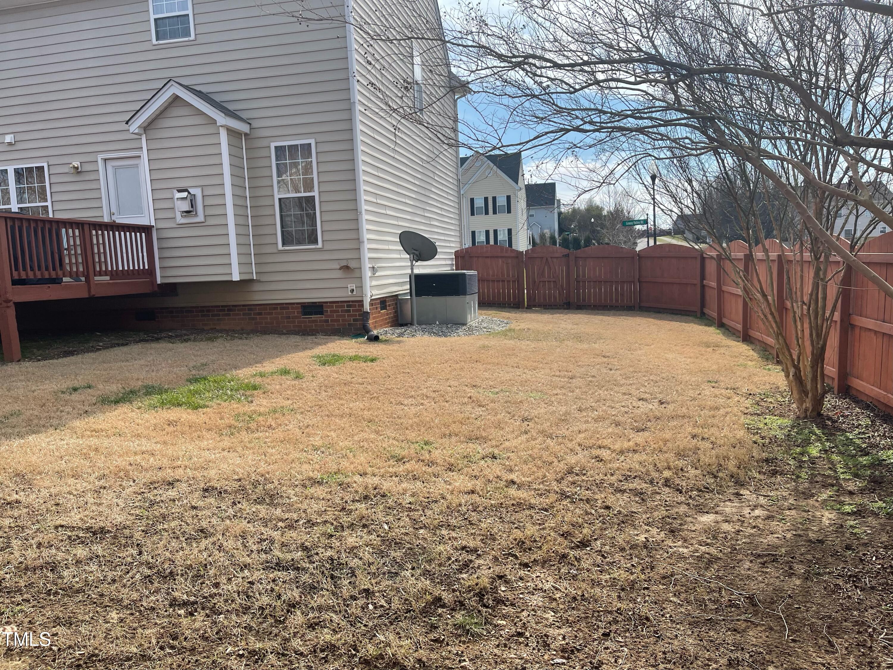 112 Grassy Valley Road Holly Springs, NC 27540 - Photo 6 of 39 a backyard of a house