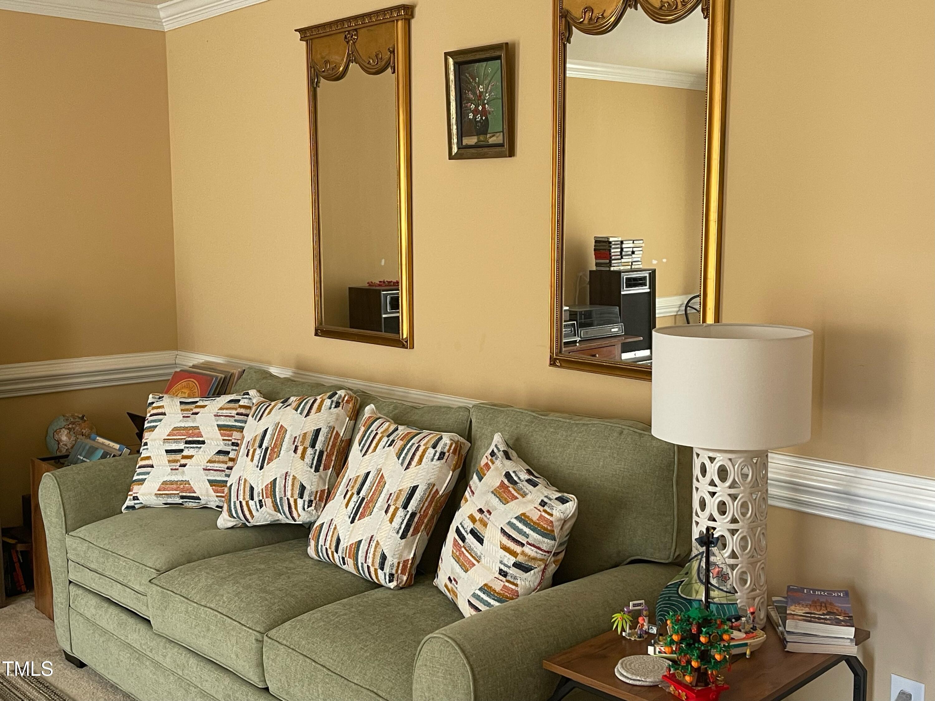 112 Grassy Valley Road Holly Springs, NC 27540 - Photo 8 of 39 a living room with a couch
