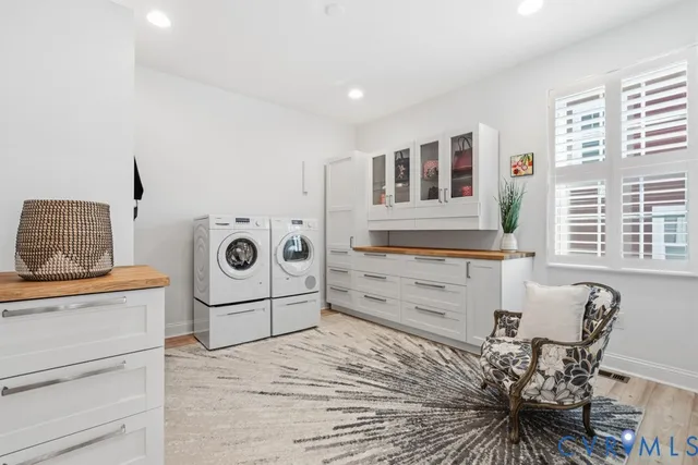 a bedroom with a bed and a table in it