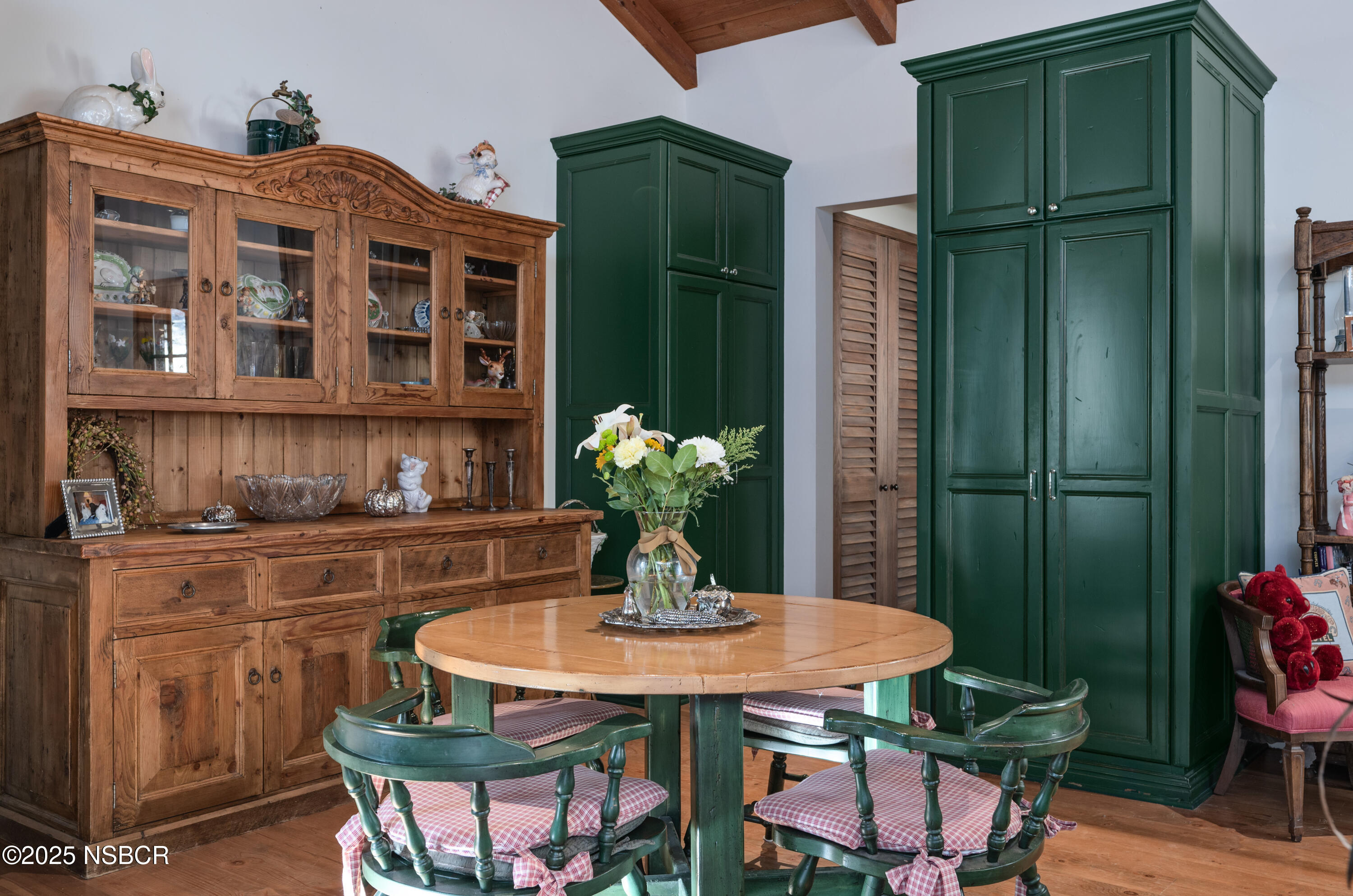 4086 East Oak Trail Road Santa Ynez, CA 93460 - Photo 33 of 57 a view of a dining table and chairs in the room