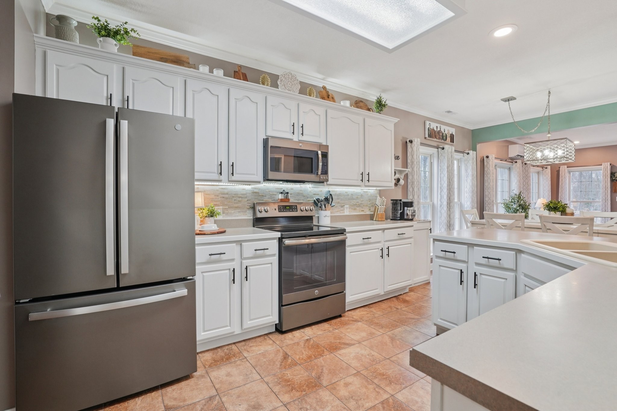 2994 Jarrell Ridge Farms Clarksville, TN 37043 - Photo 12 of 37 a kitchen with cabinets stainless steel appliances and a counter space